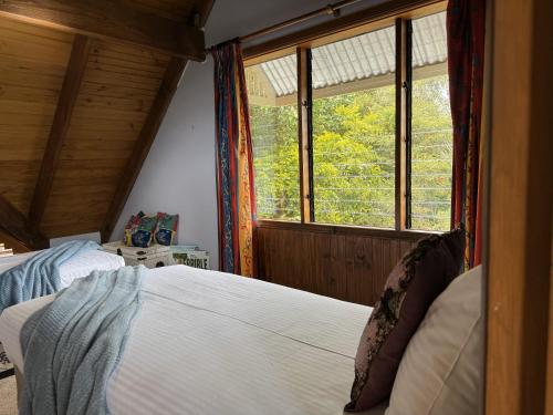 Katil atau katil-katil dalam bilik di Ruddles Retreat