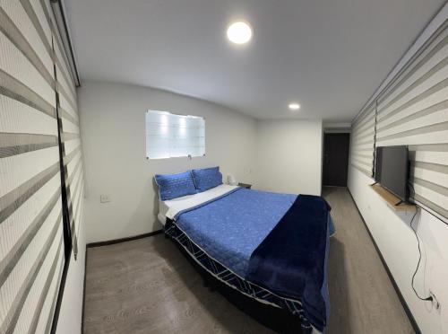 Postel nebo postele na pokoji v ubytování Hotel Dorado - Cerca al Aeropuerto - Habitación 401