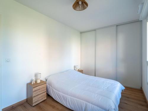 Ένα ή περισσότερα κρεβάτια σε δωμάτιο στο Appartement T4 lumineux à Biscarrosse - 6 à 8 pers. - Parking inclus - FR-1-319-599