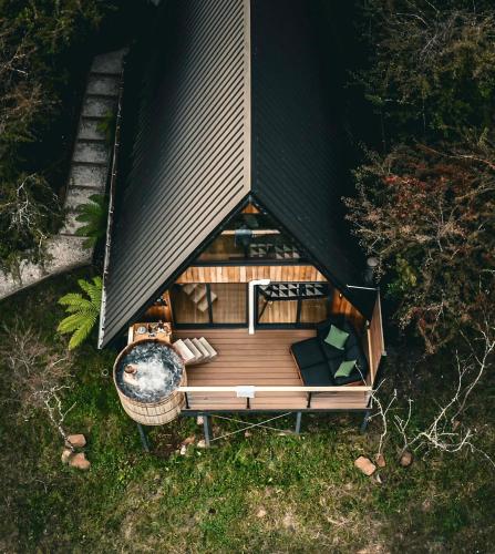 an overhead view of a small house with a deck at The Eco Cabin Tasmania - Cedar Hot Tub in Deloraine
