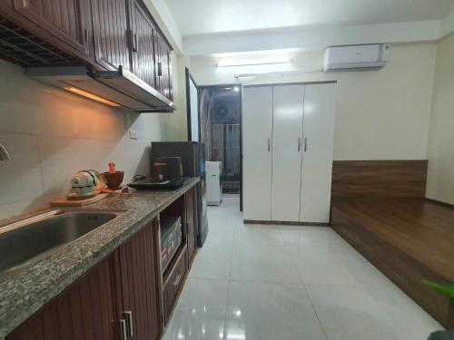 Η κουζίνα ή μικρή κουζίνα στο The Little'N Homestay Ha Noi 59