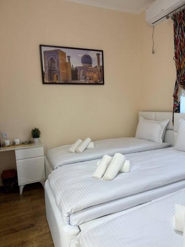 Кровать или кровати в номере UMMU ROHAT guest house
