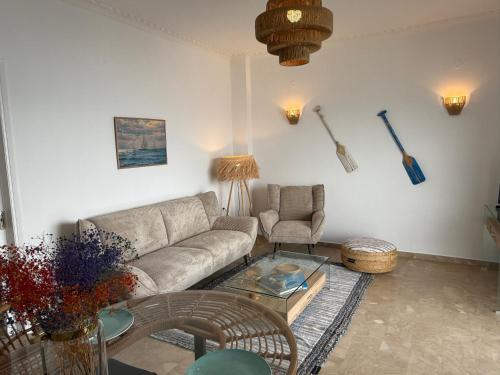 Area soggiorno di Fronte Mare Suite - Sea Front Luxury Suite With Private Beach Patio