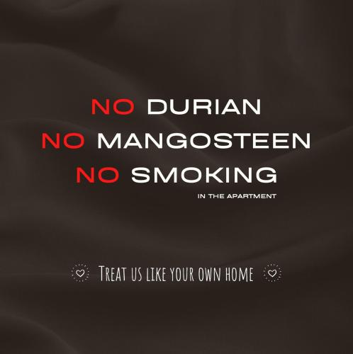 a sign that reads no durian no ambassador no smoking at The White House - 3BR Meridin Bayvue in Masai