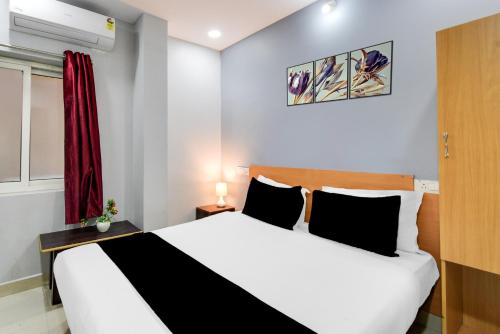 Katil atau katil-katil dalam bilik di Super Hotel O Moula Ali Near AMR Planet
