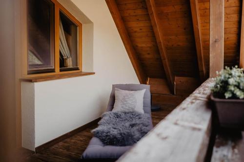 a room with a couch and a pillow on the floor at Kirnermarteshof in Oberried