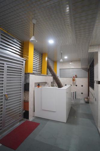 Η κουζίνα ή μικρή κουζίνα στο Nexus Corporate Stay