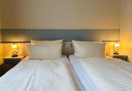 Postel nebo postele na pokoji v ubytování Stefans Gästezimmer