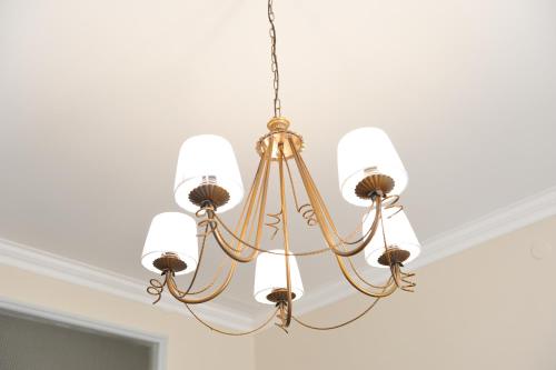 a chandelier hanging from a ceiling at Case Vacanze Terra Sinus in Terrasini