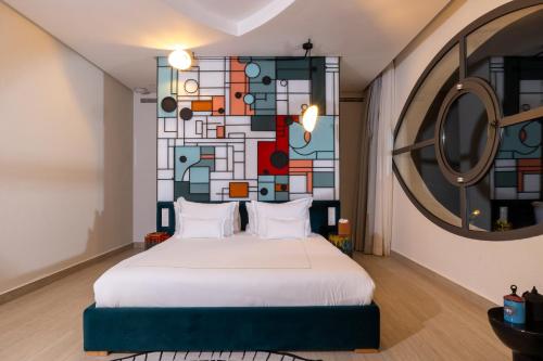 Ein Bett oder Betten in einem Zimmer der Unterkunft Yin Hotel & Spa