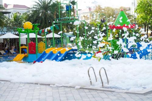 a playground covered in snow in a park at Wyndham Garden Grandworld Phu Quoc in Phu Quoc