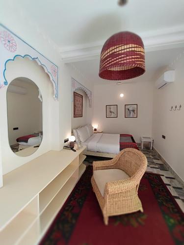 Ένα ή περισσότερα κρεβάτια σε δωμάτιο στο The Stepwell Hotel