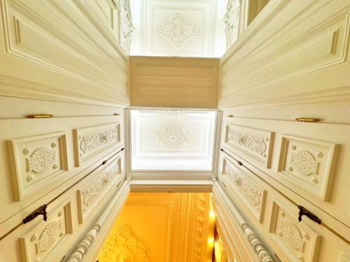 a hallway with a window in a building at 7th HEAVEN Vienna Center Apartments in Vienna