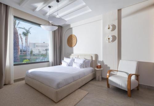 Ein Bett oder Betten in einem Zimmer der Unterkunft Yin Hotel & Spa