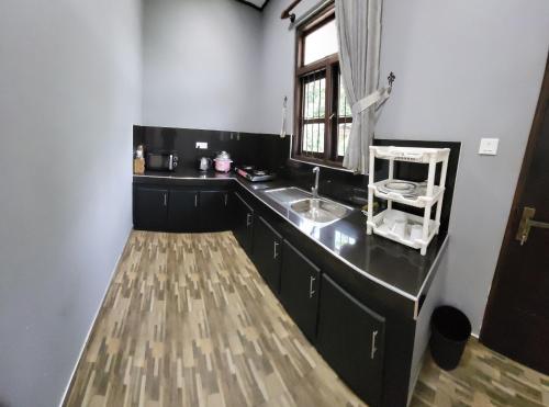 Kuchyň nebo kuchyňský kout v ubytování Juliya Guest House