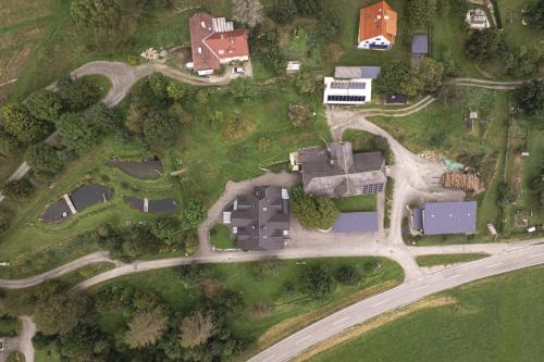 an overhead view of a yard with houses and a road at Vitalhof am Kreischberg by ALPS RESORTS in Bodendorf