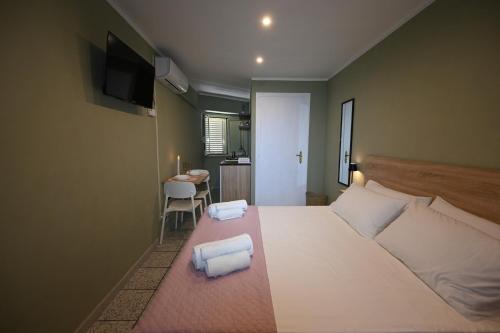 Katil atau katil-katil dalam bilik di Kiko's Rooms - Centro Tropea