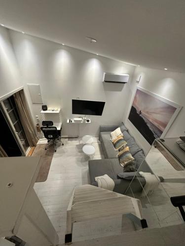 Televisyen dan/atau pusat hiburan di Little house by the beach