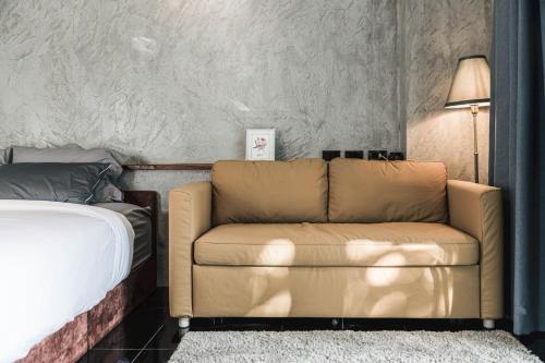 Postel nebo postele na pokoji v ubytování ฟาร์มดั๊กรีสอร์ท Farm Duck Resort