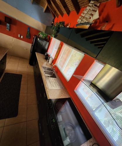 an overhead view of a kitchen with an open refrigerator at Carolina Point Resort in Crown Point