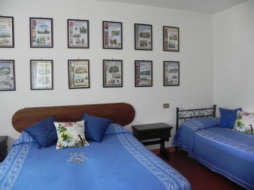 A bed or beds in a room at Agriturismo Poderi Minori