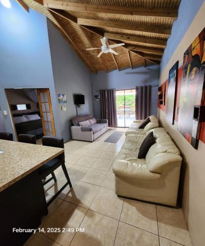 a living room with a couch and a table at Carolina Point Resort in Crown Point