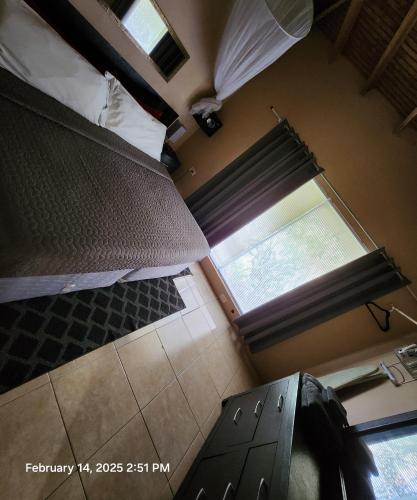 an overhead view of a bedroom with a bed and a window at Carolina Point Resort in Crown Point