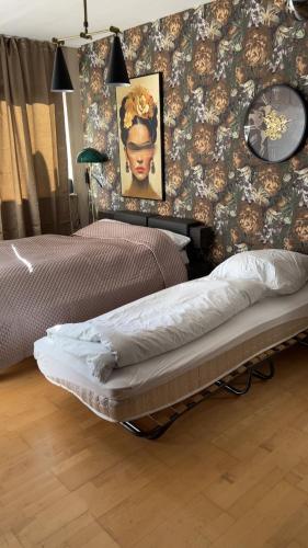 Giường trong phòng chung tại Studioroom Apartment Cologne Altstadt City