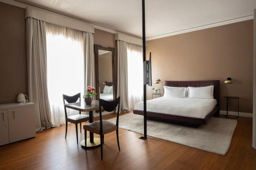 Кровать или кровати в номере Butterfly Verona