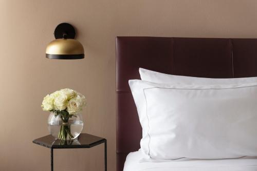 Кровать или кровати в номере Butterfly Verona