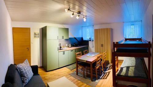 Kuchyň nebo kuchyňský kout v ubytování Apartmány v ráji (Českém)