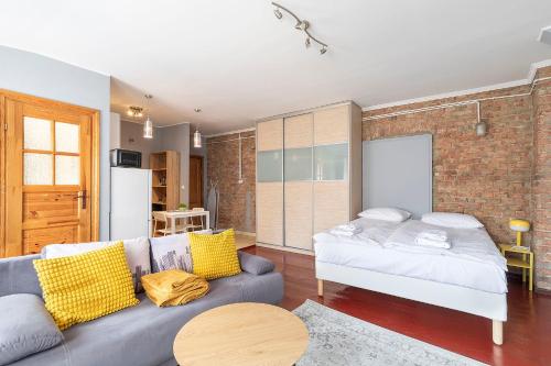 Postel nebo postele na pokoji v ubytování Apartamenty ADM