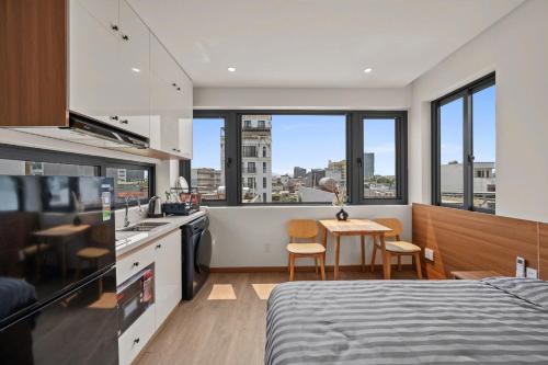 Kuchyň nebo kuchyňský kout v ubytování Eleva Apartment