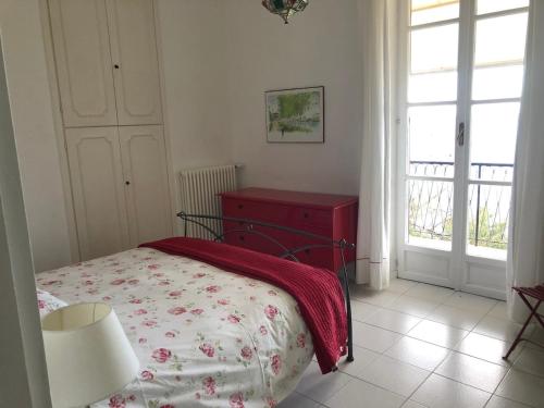 Ένα ή περισσότερα κρεβάτια σε δωμάτιο στο Casa Latte, Sea View