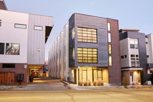 a group of buildings on a city street at Sonder by Marriott Bonvoy Zuni Apartments LoHi in Denver