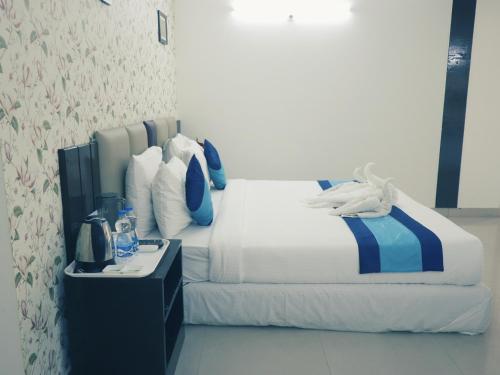 Ένα ή περισσότερα κρεβάτια σε δωμάτιο στο The Green Path Eco Hotel