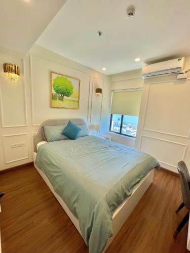 Katil atau katil-katil dalam bilik di FLC Sea Tower Quy Nhơn - Căn hộ view biển
