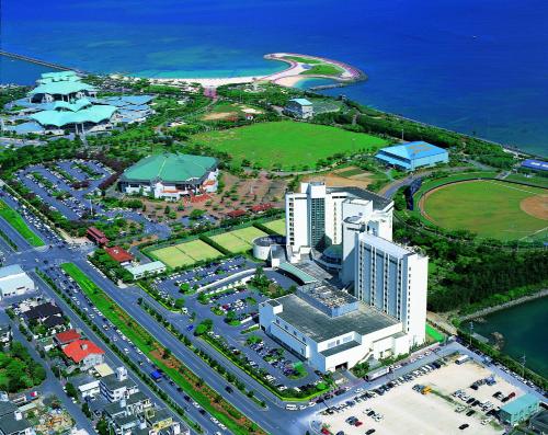 an overhead view of a city with a parking lot at Laguna Garden Hotel in Ginowan