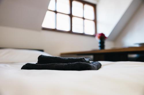 Postel nebo postele na pokoji v ubytování Apartmány U Doskočilů