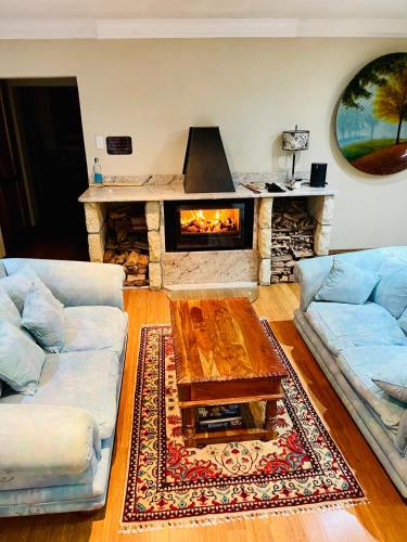 Χώρος καθιστικού στο Clarens Grand Villa