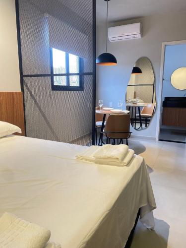 Ένα ή περισσότερα κρεβάτια σε δωμάτιο στο Apartamento completo próximo a USP São Carlos