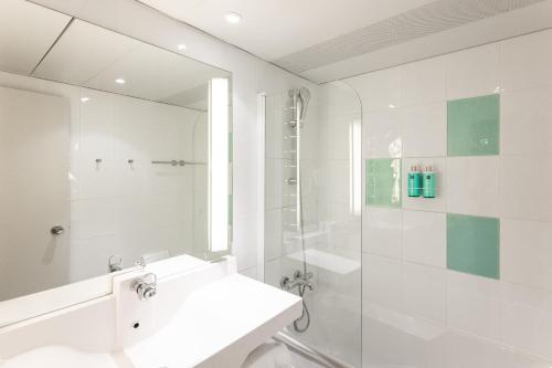Ένα μπάνιο στο Novotel Grenoble Nord Voreppe