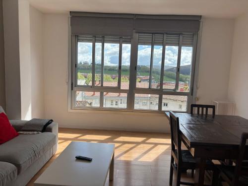 Posezení v ubytování Amplio piso con vistas en la entrada del camino C4