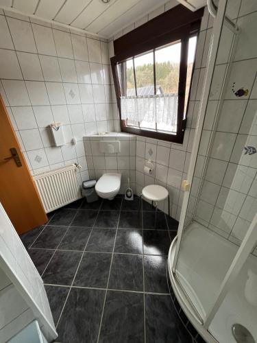 Ένα μπάνιο στο Ferienwohnung Heinz Romes