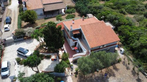 Φωτογραφία από το άλμπουμ του Appartamento in Villa con giardino (2) σε Porto Torres