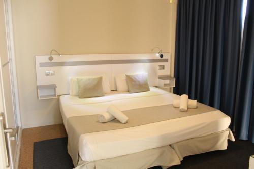 Postel nebo postele na pokoji v ubytování Apartamentos Fayna