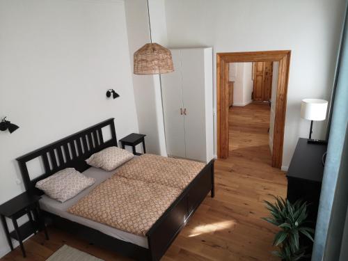 Postel nebo postele na pokoji v ubytování Kleinstadtidyll