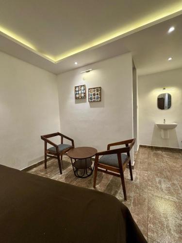 Posezení v ubytování PPR Courtyard Guruvayur by LexStays
