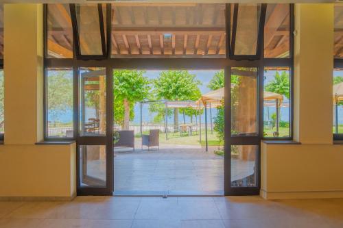 an open door in a building with a patio at La Carrozza d'Oro in Montefiascone