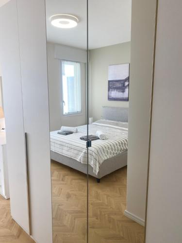 Luxury Apartment Conegliano Centroにあるベッド